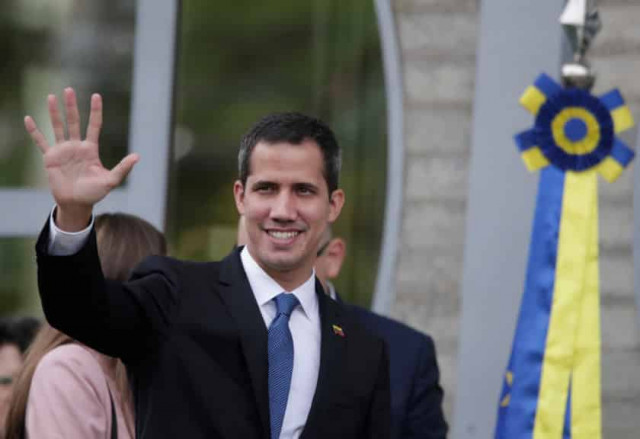 Venezuela's Guaido vows to return to Caracas despite threat of prison