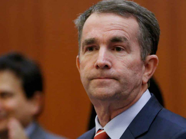 Ralph Northam: Virginia governor apologises for 'racist and offensive' yearbook costume but refuses to resign