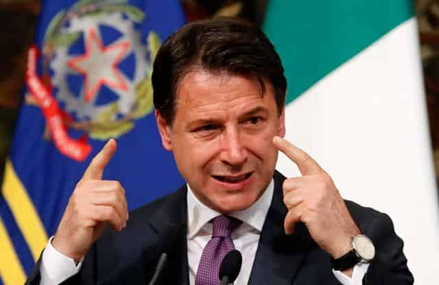 Italian PM threatens to quit, tells coalition to end feud