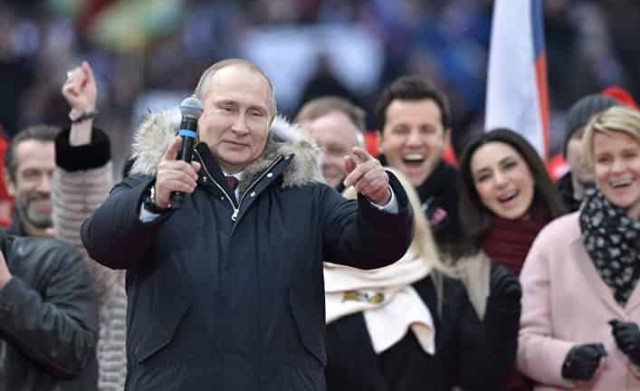 Россиян заставляли идти на предвыборный митинг Путина
