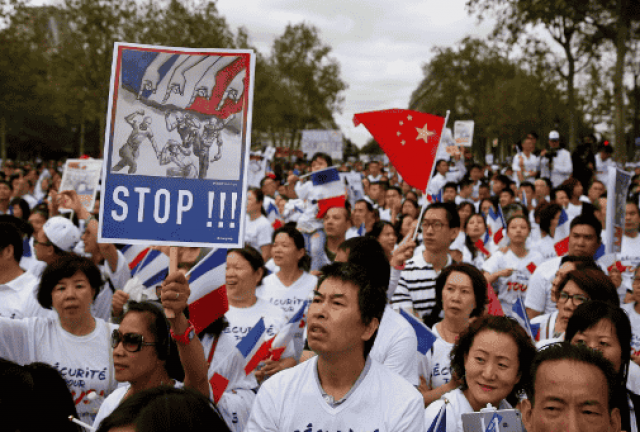 В Париже прошел митинг в защиту азиатских мигрантов
