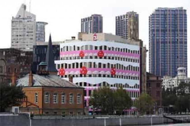 Здание в виде гигантского торта возмутило власти Шанхая