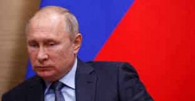 Putin threatens arms race if US dumps nuclear treaty