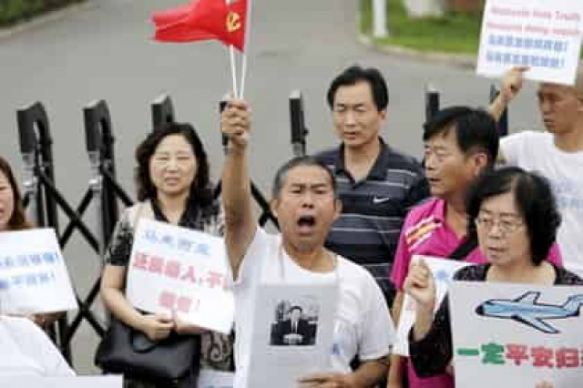 В Китае родственники пассажиров пропавшего MH370 подали иск к Malaysia Airlines