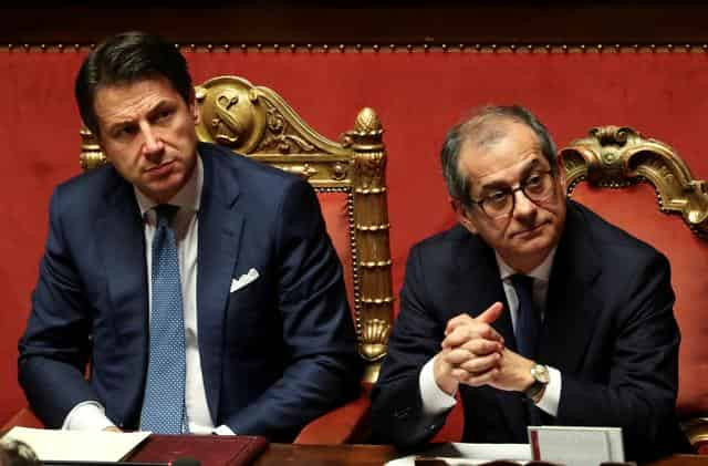 Moderate leaders try to protect Italy - from their own government