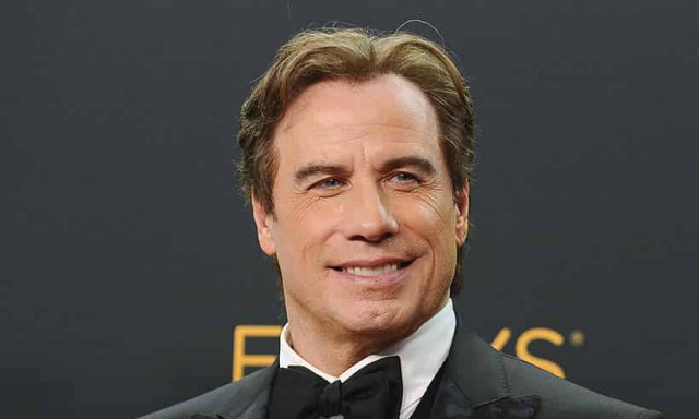 Fans are loving John Travolta's bald look - see the photo