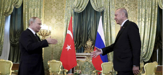 Putin hosts Turkey’s leader to discuss weapons deal, Syria