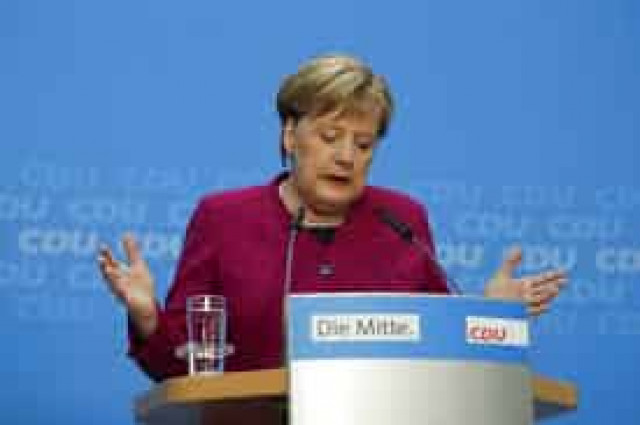 German leader Merkel heads to Athens; demonstrations banned