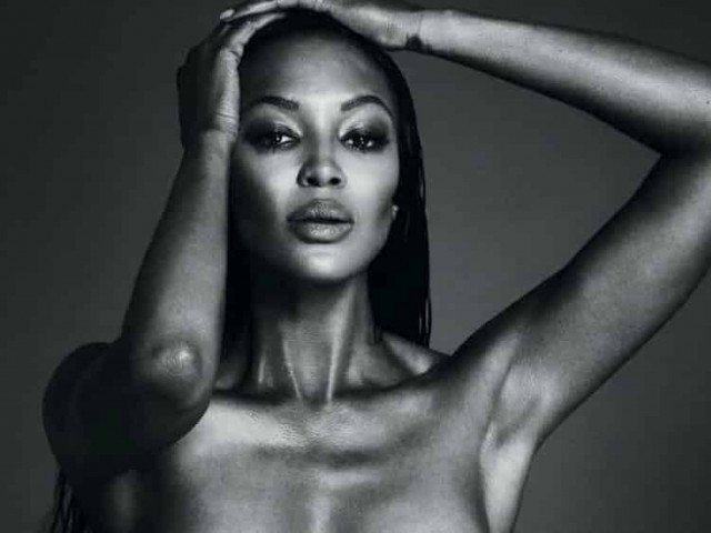 Naomi Campbell poses almost nude for Vogue