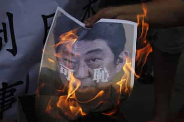 Мужчина в центре Токио совершил политическое самосожжение