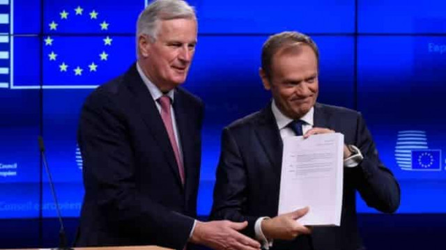 Brexit: EU's Barnier warns of 'long road ahead'