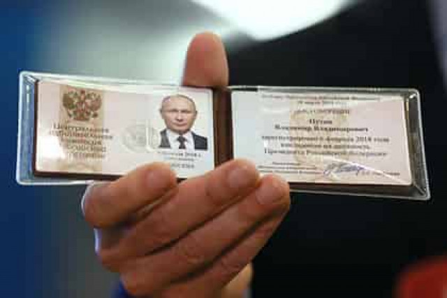 Регистрацию Путина кандидатом в президенты признали законной
