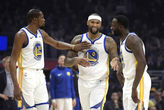 Boogie Cousins overcomes nerves in 1st game with Warriors