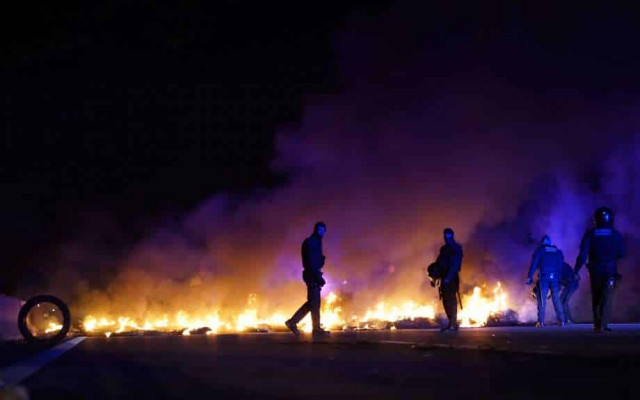 Catalonia protesters burn tires, block highways over separatist trial