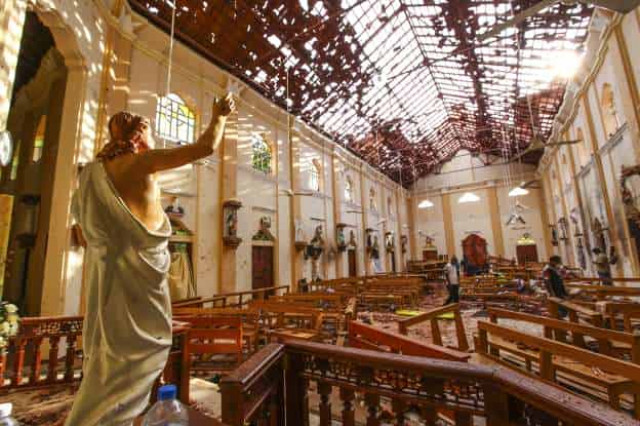 In tearful ceremony, Sri Lanka Catholics mark one month since bombings