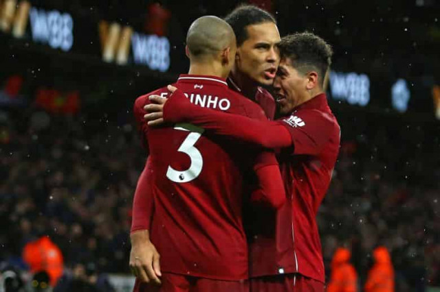 Liverpool seal Christmas top spot as Salah and Van Dijk sink Wolves