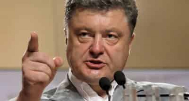 Порошенко пообещал привлечь к ответственности виновных в харьковском теракте