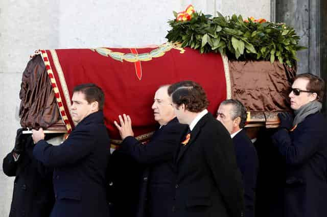 Behind closed doors, Spain exhumes Franco's remains