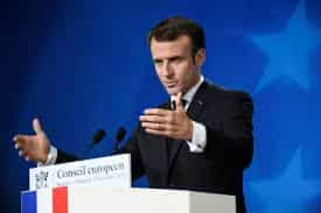 France's Macron praises courage of slain Syrian radio activist Fares