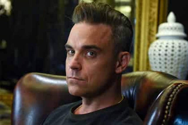 Робби Уильямс рассказал о «темном» страхе перед визитом в Россию
