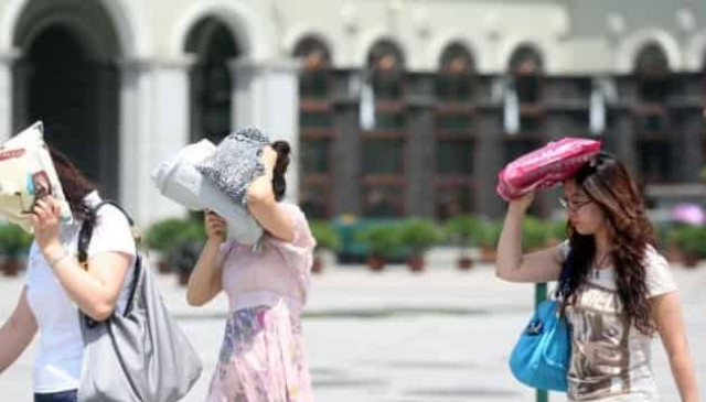 В Японии от аномальной жары пострадали тысячи людей