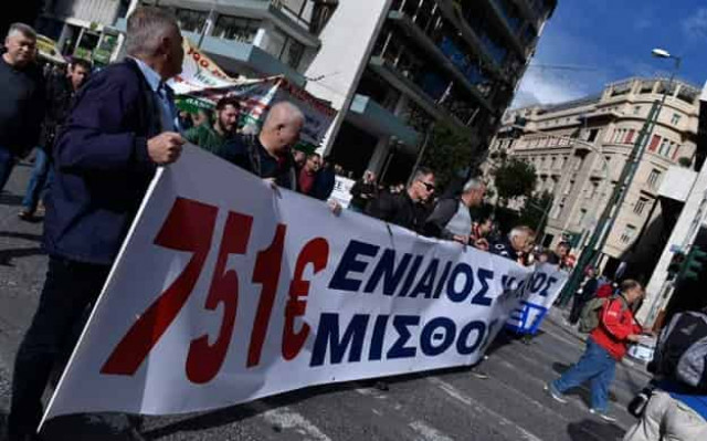 Greek workers strike, seeking wage hike, tax cuts