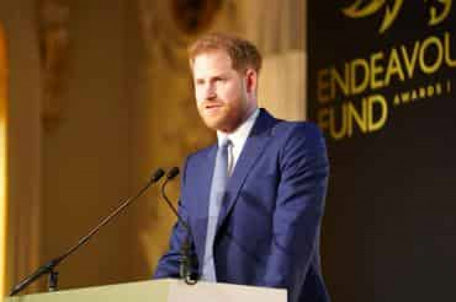 UK's Prince Harry receives apology over story saying he turned back on Marines