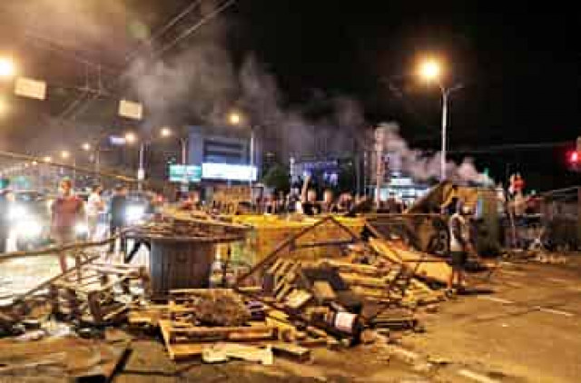 Belarusian opposition leader Tikhanouskaya 'safe' in Lithuania after clashes