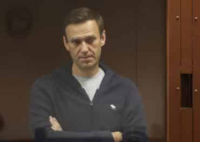 Kremlin critic Navalny back in court for slander trial amid tensions with West